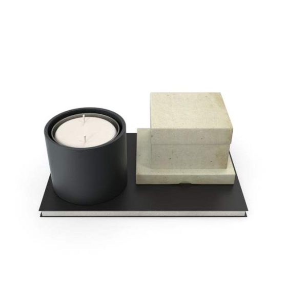 Candle and Small Box on Notebook